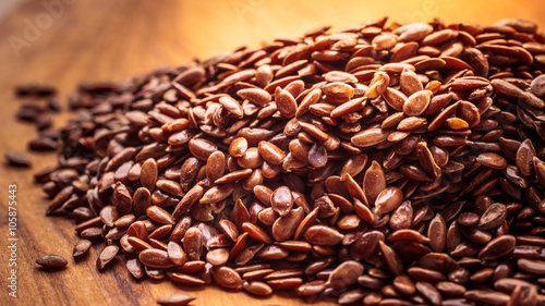 Heap of flax seeds linseed closeup