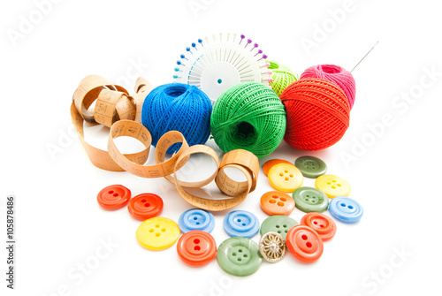 pins, meter, plastic buttons and thread