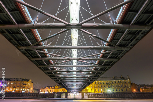 Bernatka footbridge over Vistula river in the night in Krakow, Poland