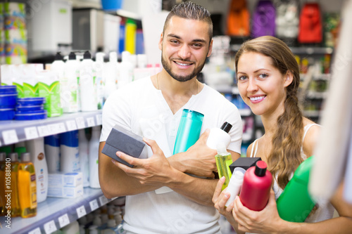 Couple with shampoo in the store.