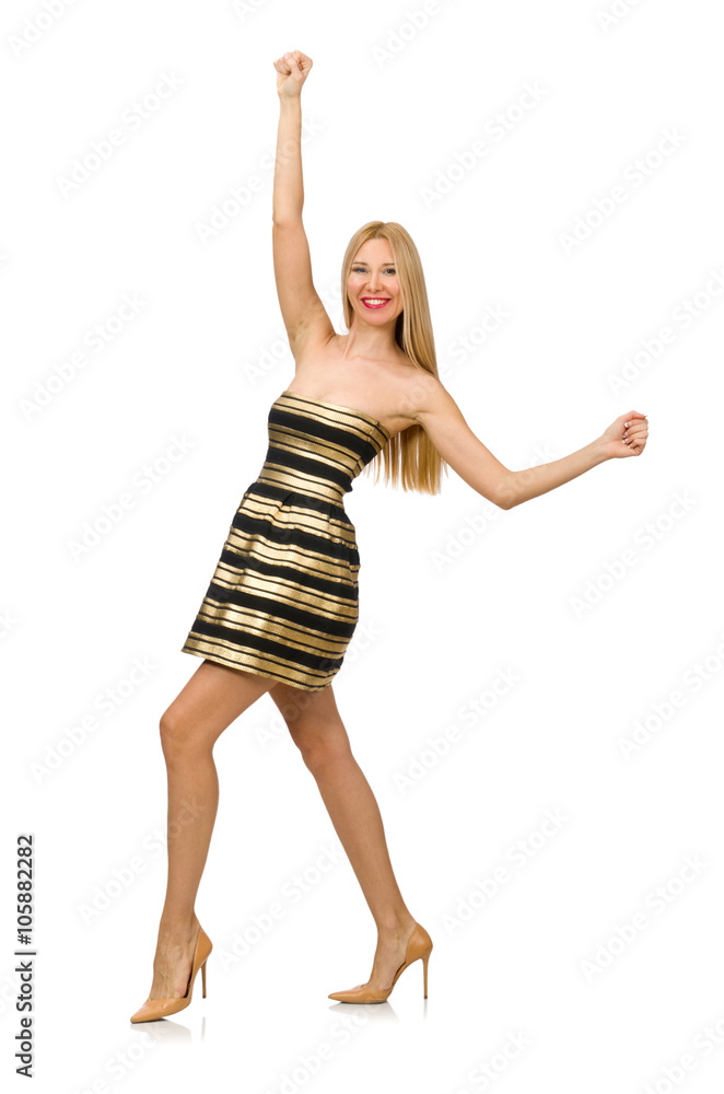 Woman in striped gold and black dress isolated on white