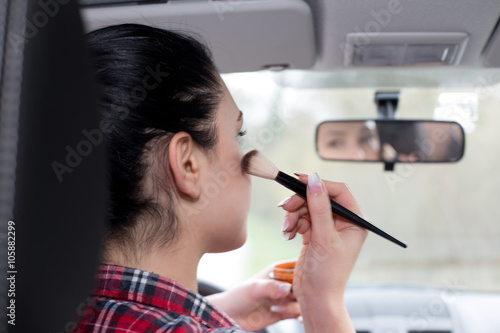 Girl makeup in the car