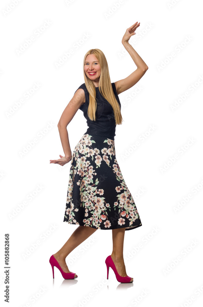 Woman in black floral dress isolated on white