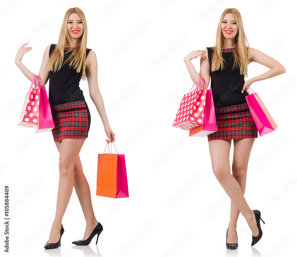 Woman with shopping bags isolated on white Woman with shopping bags isolated on white