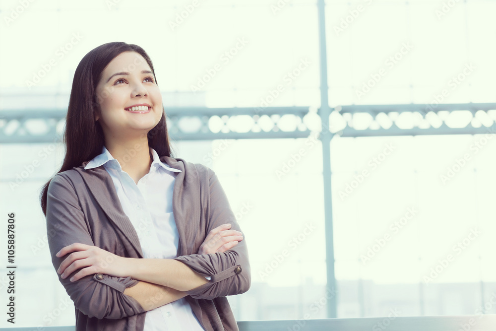 Attractive woman in office building Attractive woman in office building