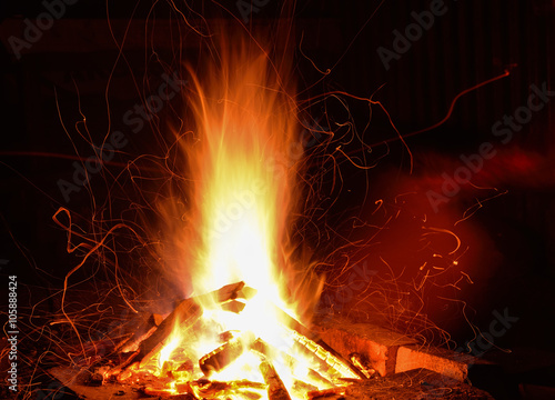 Colorful vibrant Bonfire outdoors at night