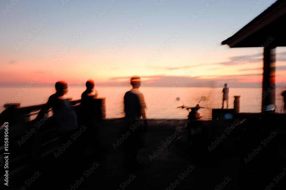 Abstract Blur silhouette of man fishing rod sunset background