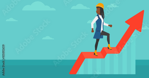 Woman standing on uprising chart.