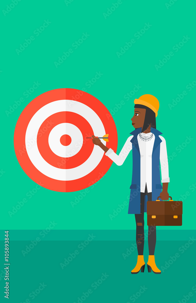 Business woman with target board. Business woman with target board.
