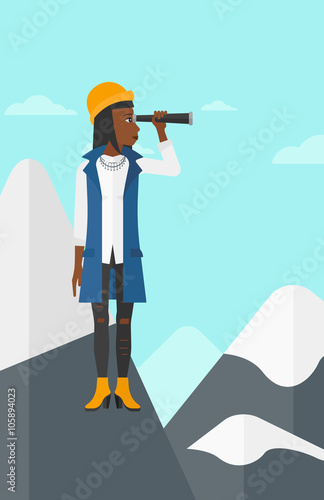 Business woman looking through spyglass.