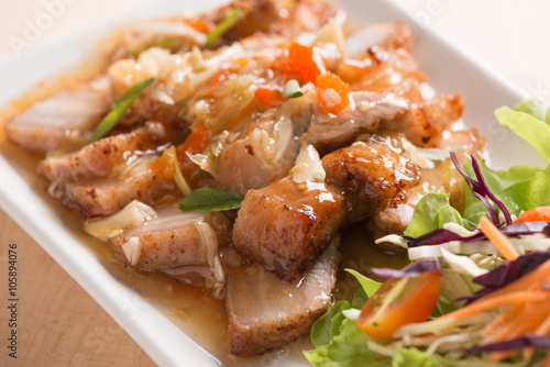 Deep fried pork Chinese Style belly with spicy sauce