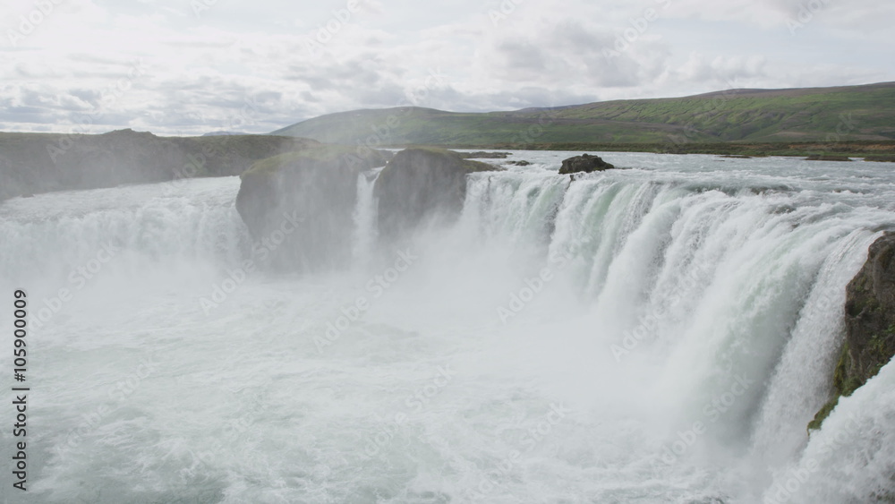 Waterfall Godafoss on Iceland. Famous tourist attractions and landmarks in Icelandic nature landscape. Travel sightseeing on Iceland. RED EPIC SLOW MOTION. Waterfall Godafoss on Iceland. Famous tourist attractions and landmarks in Icelandic nature landscape. Travel sightseeing on Iceland. RED EPIC SLOW MOTION.