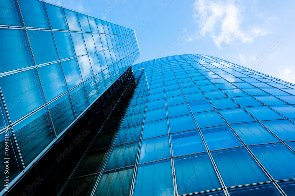 Obraz premium Blue skyscraper facade. office buildings. modern glass silhouett