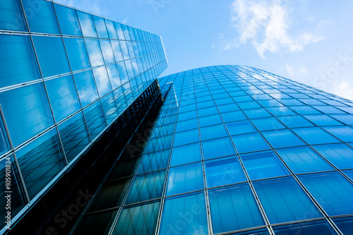 Blue skyscraper facade. office buildings. modern glass silhouett
