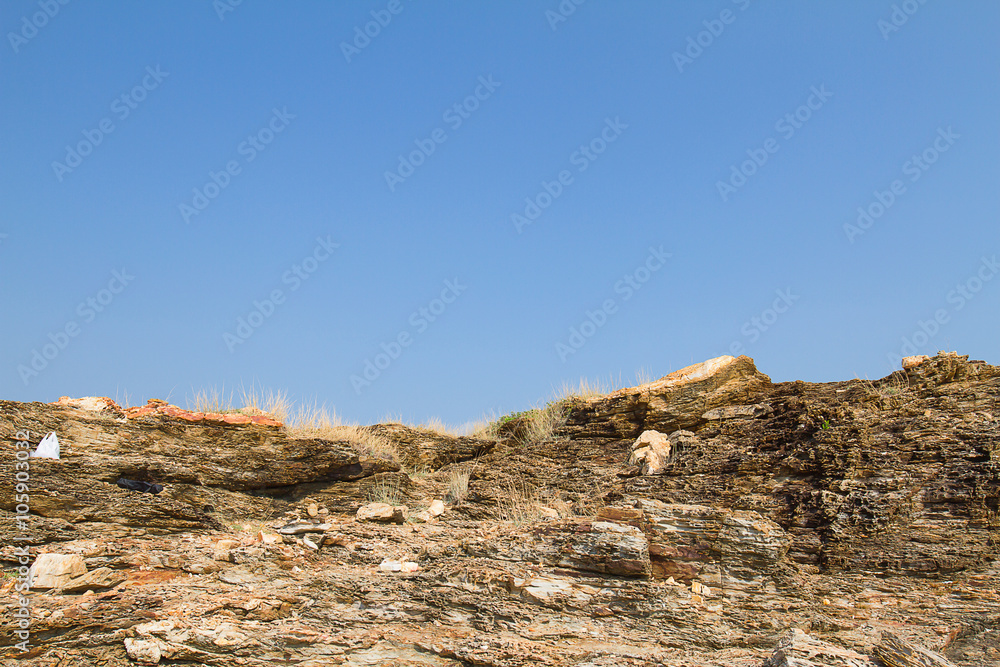 Small hill and rocks against clear blue sky at Khao Laem Ya National park Thailand