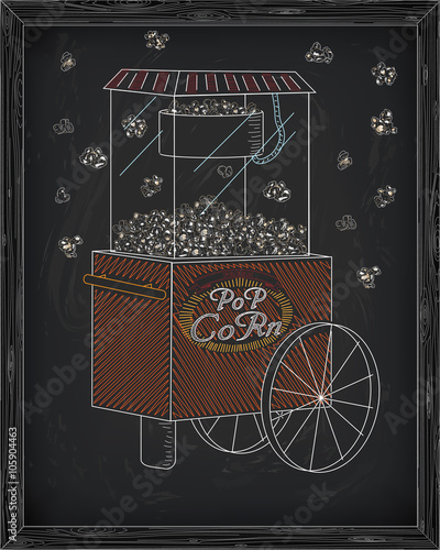 Popcorn machine on on wheels. Falling popcorn