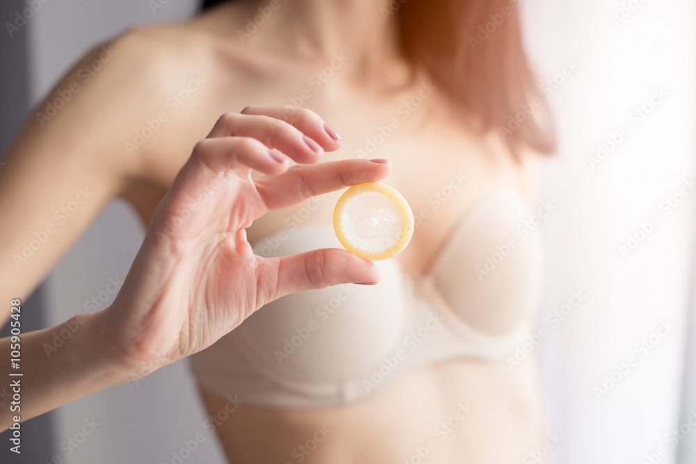 open condom on woman in underwear, Stock Video