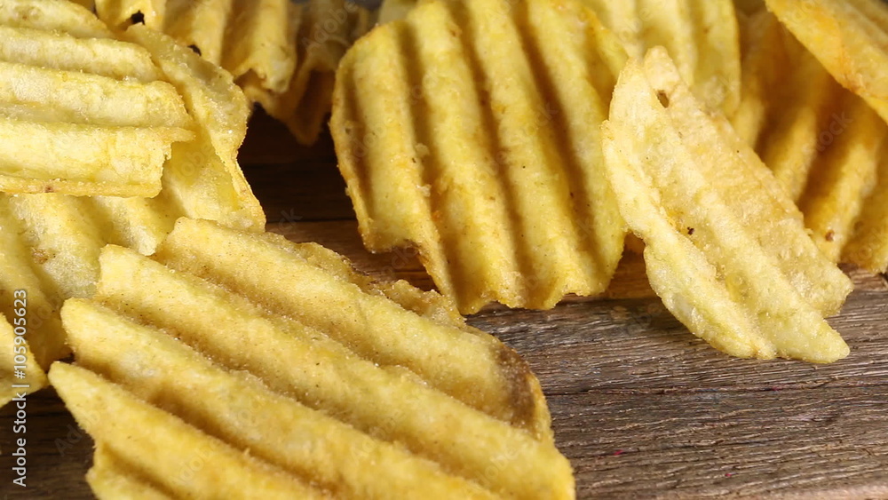 Rippled potato chips. Macro dolly shot.