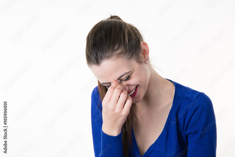 Woman giggles covering her mouth with hand isolated Woman giggles covering her mouth with hand isolated