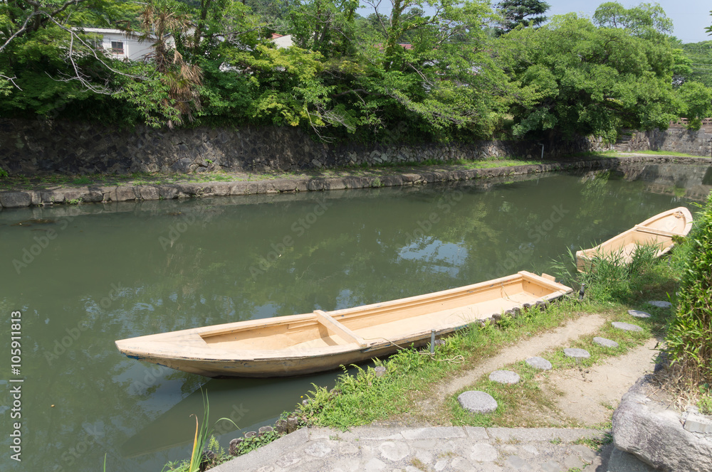 Boat on moat of Hikone castle. 