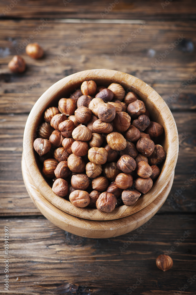 Raw hazelnuts on the vintage table
