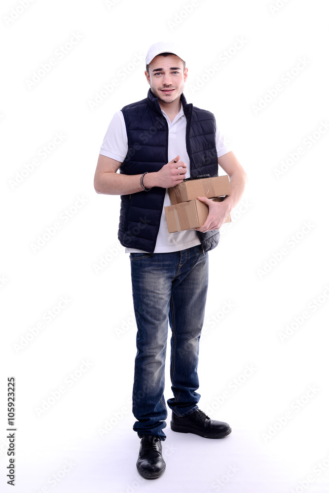 handsome young delivery man isolated on a white background holding a parcel handsome young delivery man isolated on a white background holding a parcel