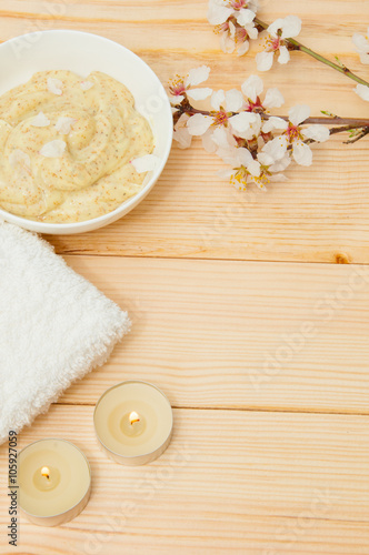Beautiful spa composition with spring flowers on table close up