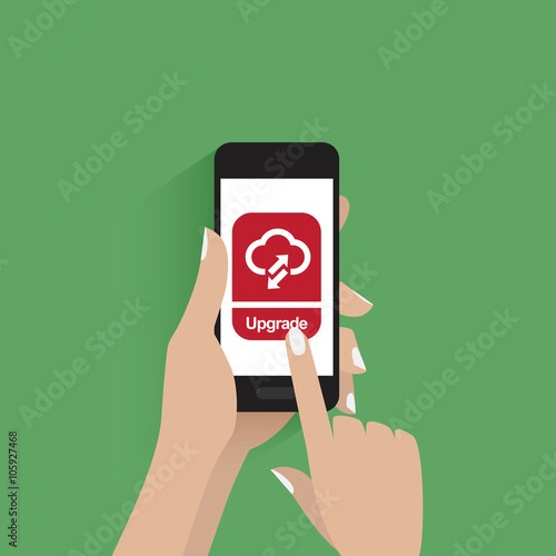 Hands holding and using modern smartphone with upgrade button on the screen. Icon isolated on green background.