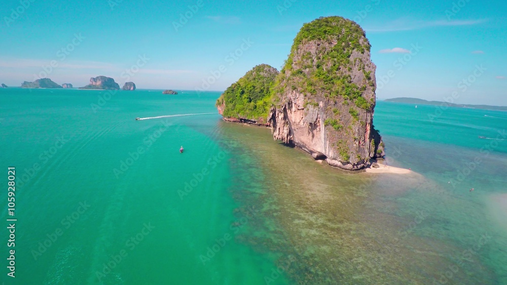 Aerial round 360 degrees view on tropical beach (Pranang beach) and rocks, Krabi, Thailand, 4k
Aerial round 360 degrees view on tropical beach (Pranang beach) and rocks, Krabi, Thailand, 4k