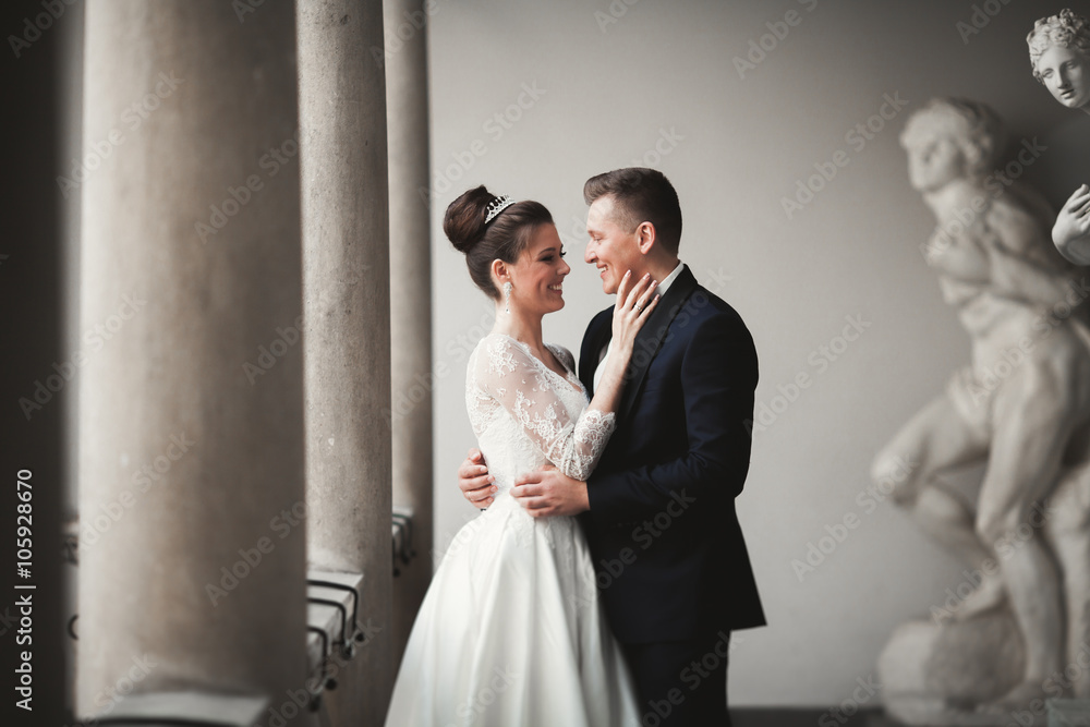 Luxury married wedding couple, bride and groom posing in old city Luxury married wedding couple, bride and groom posing in old city