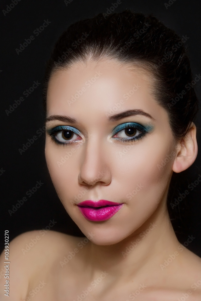 Beauty portrait of a beautiful model with a professional make-up Beauty portrait of a beautiful model with a professional make-up