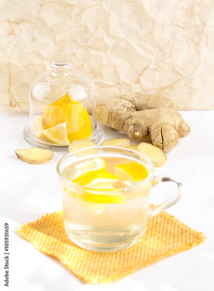 ginger tea with lemon in a glass cup ginger tea with lemon in a glass cup