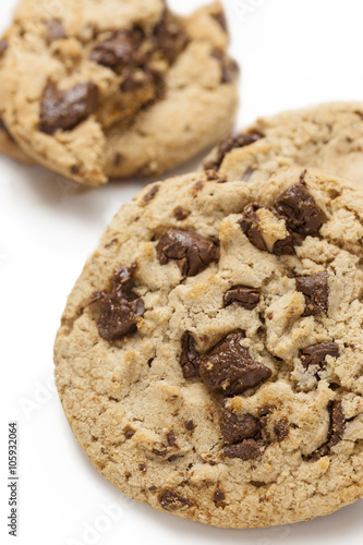 Chocolate chip cookie on white background.
