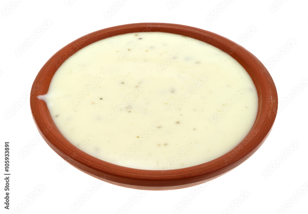 Bowl of ranch dressing on a white background Bowl of ranch dressing on a white background