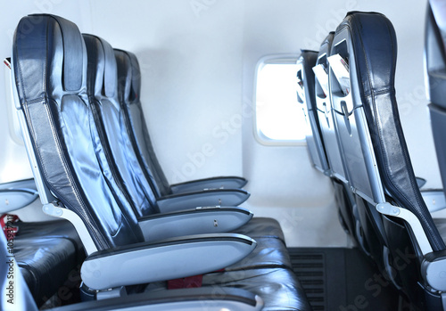 empty seats inside of a airplane. 