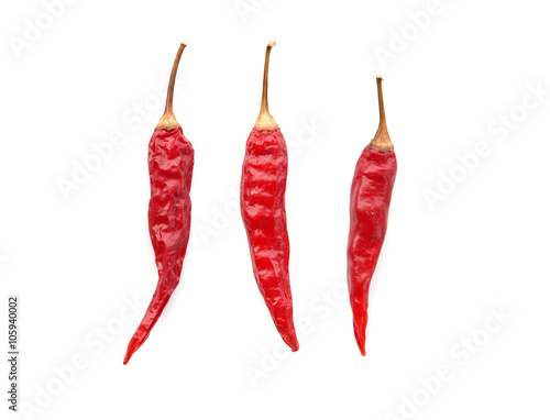 dried hot red chili peppers isolated on white background