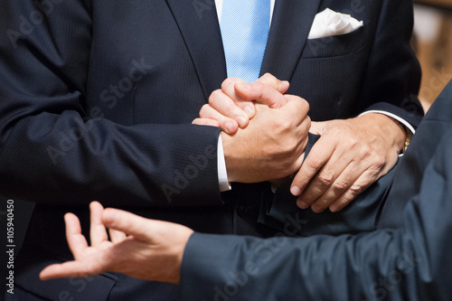 Ministers shake hand