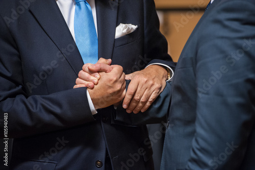 Ministers shake hand photo