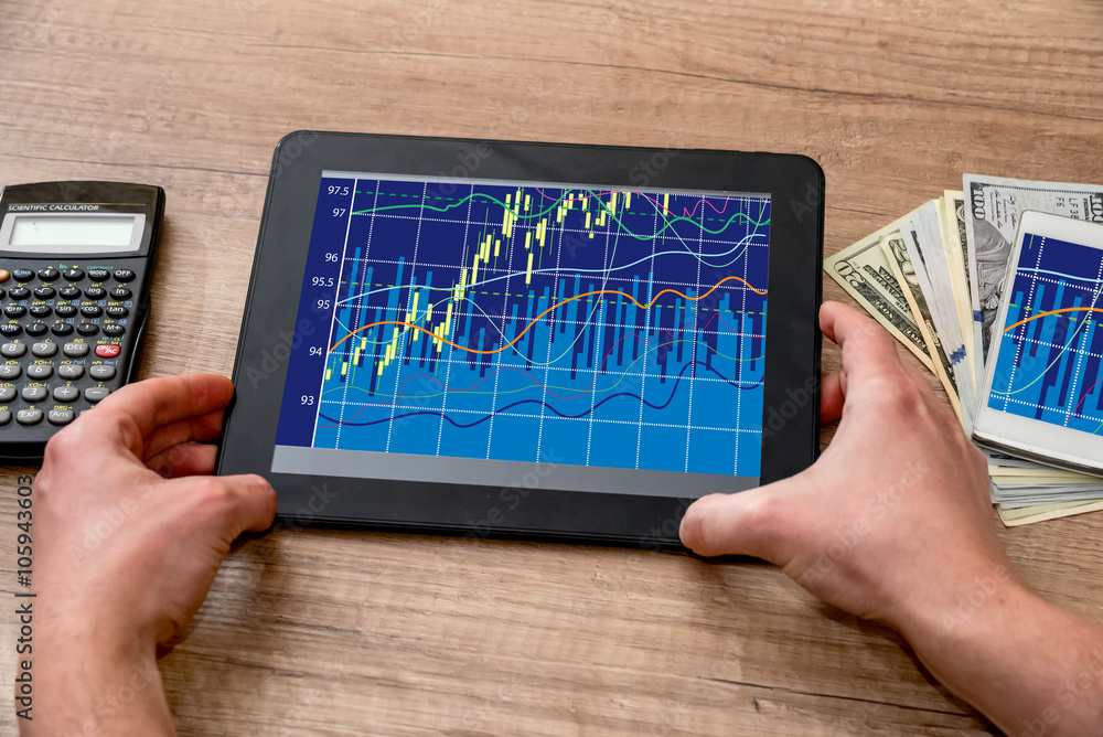 business concept - graph, calculator, tablet and pen on desk business concept - graph, calculator, tablet and pen on desk