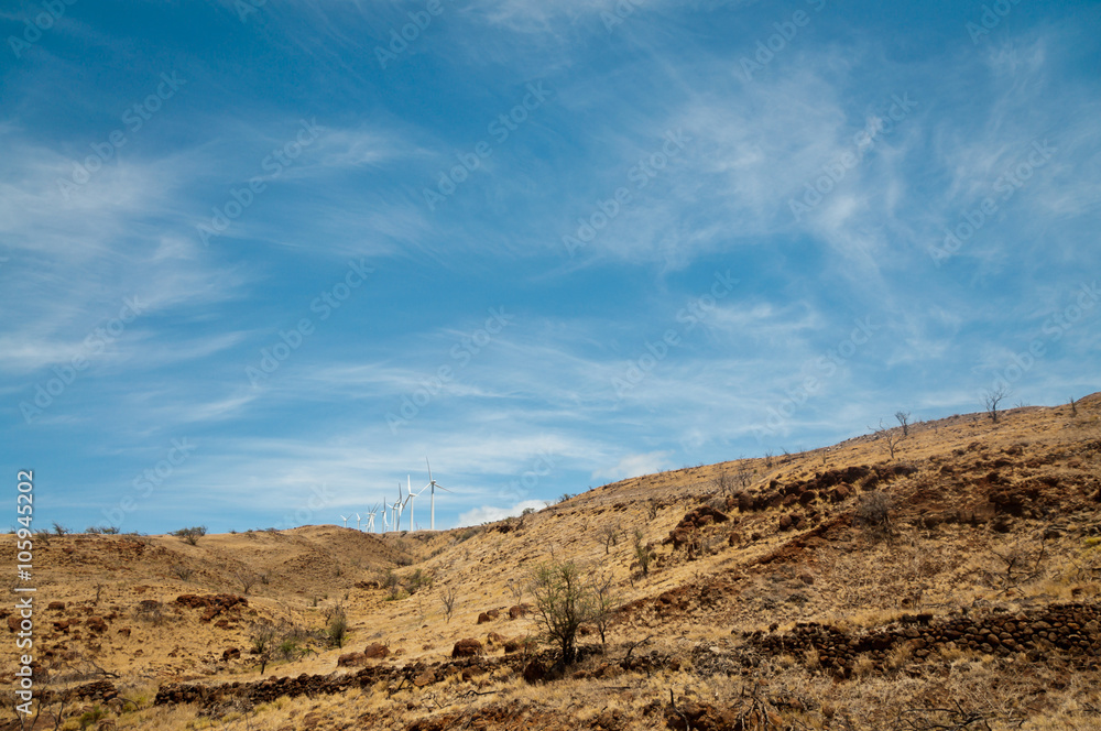 Row of wind turbines on a dry hill Row of wind turbines on a dry hill
