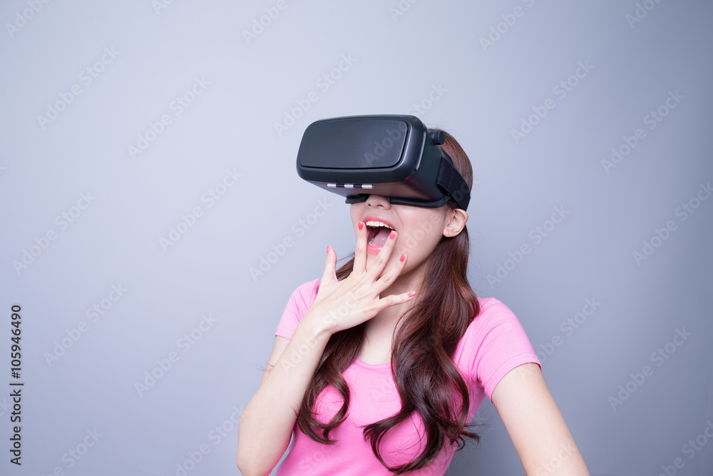 Afraid woman watching virtual reality Afraid woman watching virtual reality