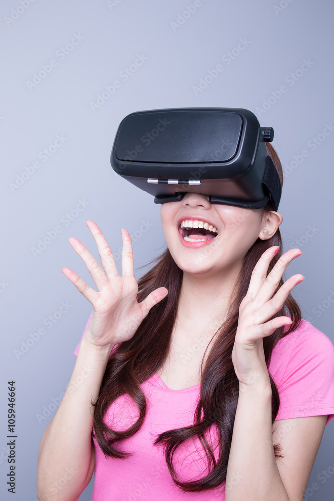 Happy woman watching virtual reality