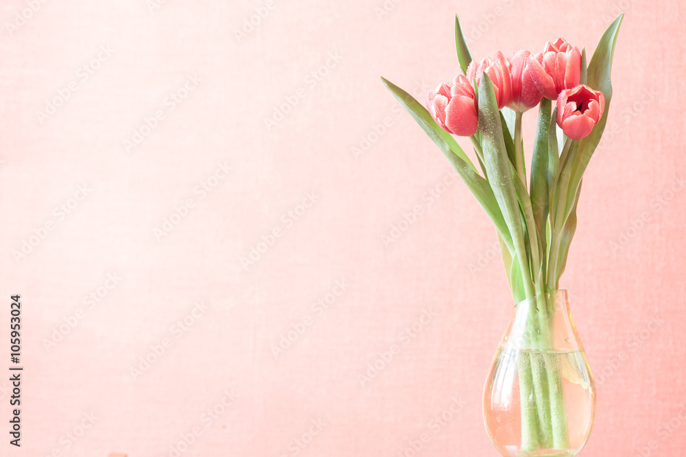 vintage bouquet of red tulips in vase, space for text