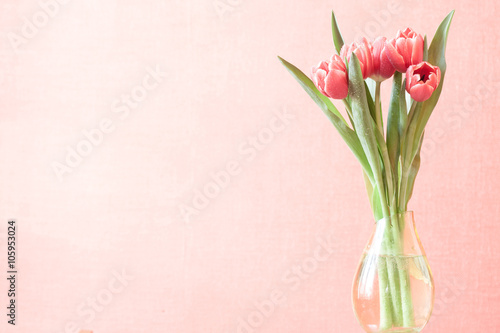 vintage bouquet of red tulips in vase, space for text © larineb