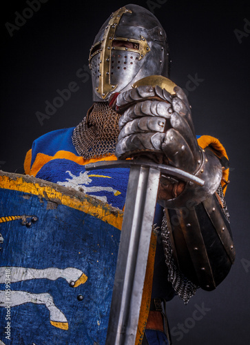 A man in kinight armour. photo