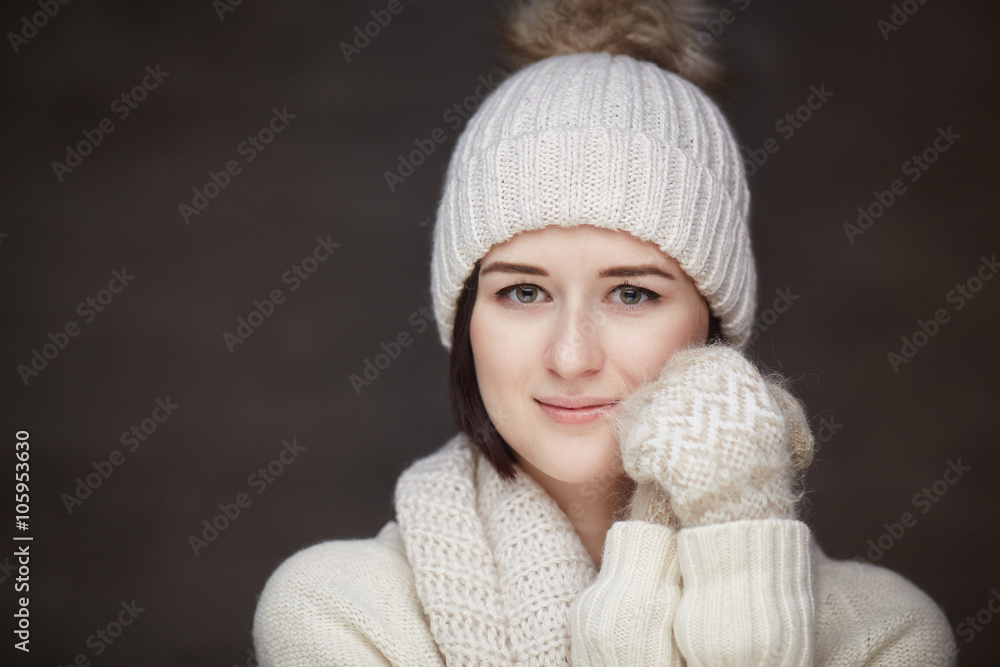 Portrait of a girl in a white sweater. Portrait of a girl in a white sweater.