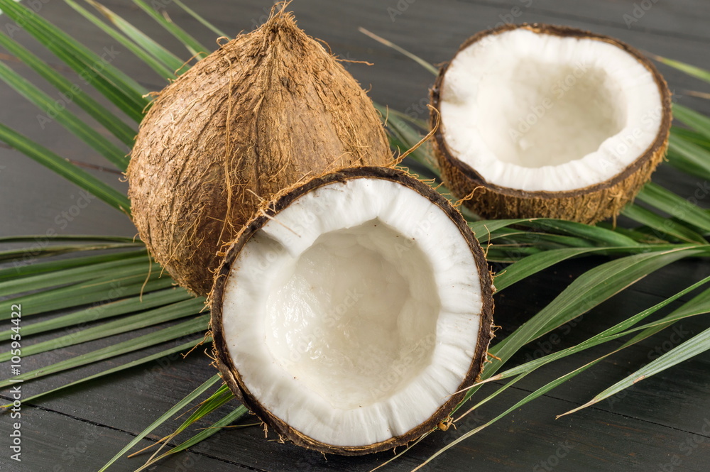 Fresh coconuts and coconut leaves Fresh coconuts and coconut leaves
