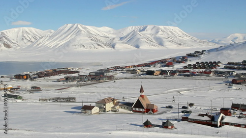 Longyearbyen, Svalbard. Norway. The small town is surrounded by mountains. A Sunny day in March. Timelapse.