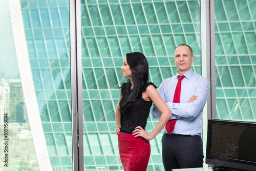 Business team standing in office . 