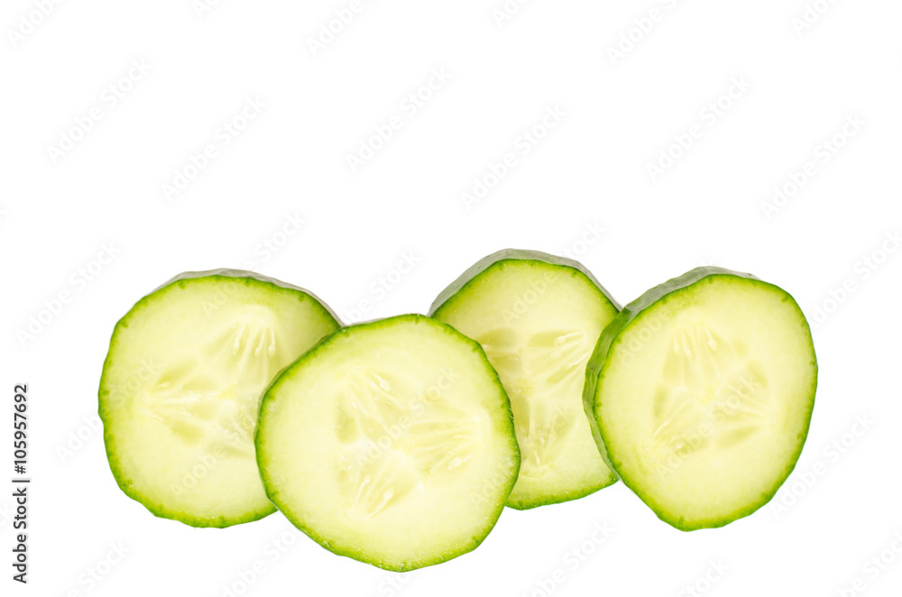 Cucumber and slices isolated over white background.